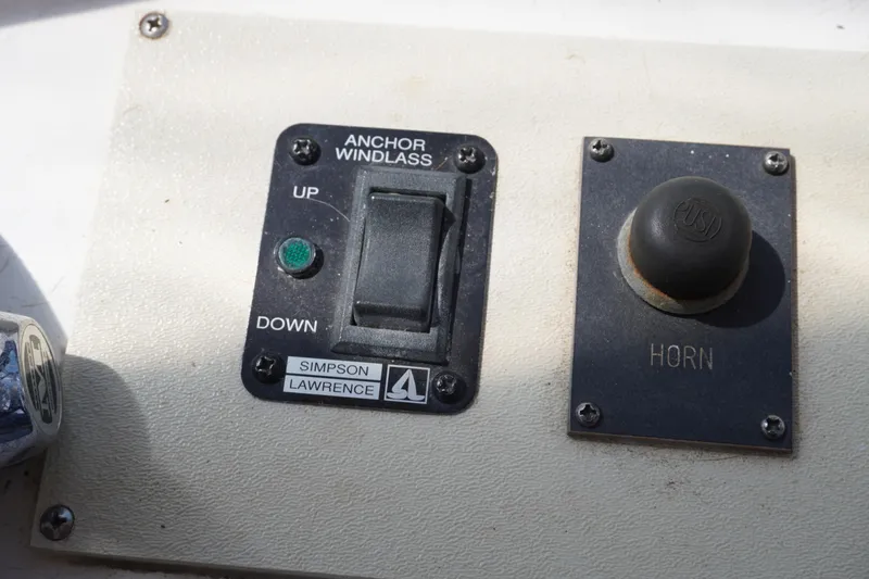 Slide: The Image of Control panel of 1996 Symbol 41 Yacht with anchor windlass and horn. - 16