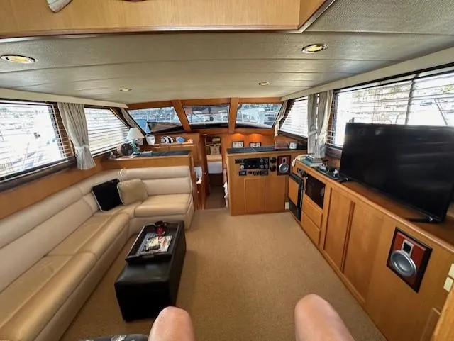 Slide: The Image of Interior of 1996 Symbol 41 Aft Cabin Yacht with sofa and TV. - 17