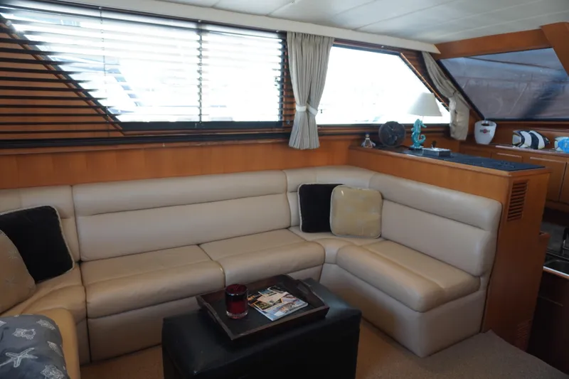 Slide: The Image of Interior of 1996 Symbol 41 Aft Cabin Yacht with beige sofa. - 19