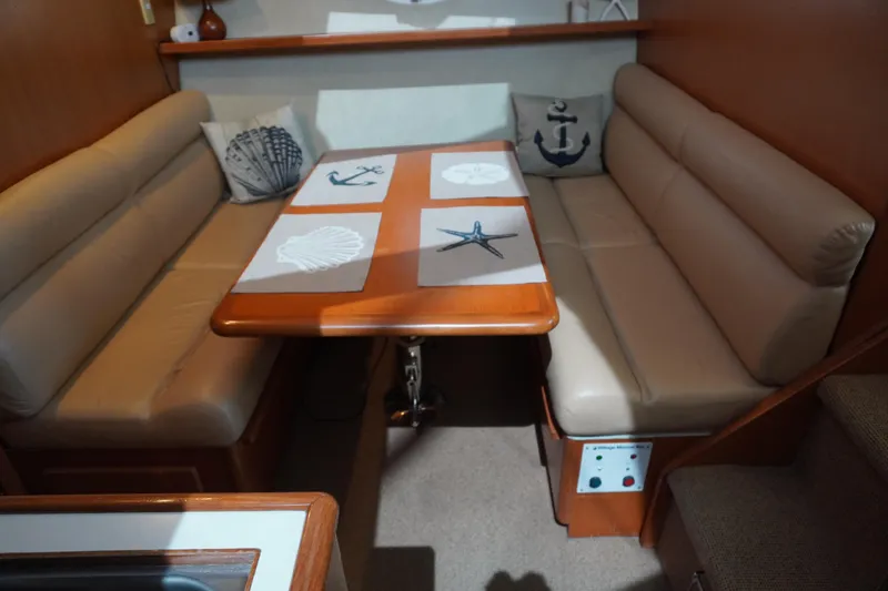 Slide: The Image of Interior of 1996 Symbol 41 Aft Cabin Yacht with cozy seating area. - 26