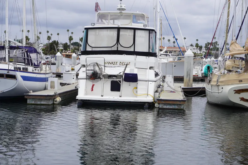 Slide: The Image of 1996 Symbol 41 Aft Cabin Motor Yacht docked in marina. - 3