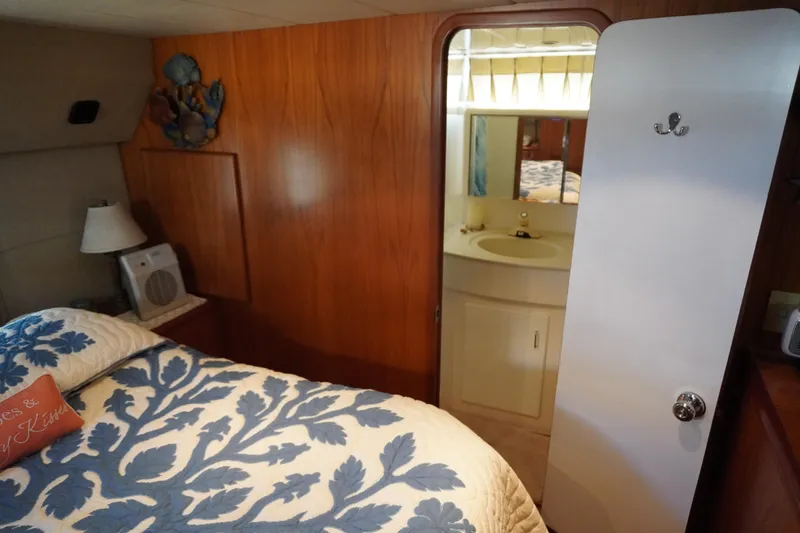 Slide: The Image of 1996 Symbol 41 Aft Cabin Yacht interior with bed and bathroom. - 32