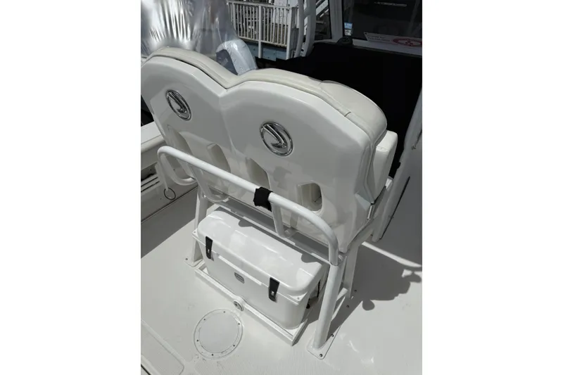 Slide: The Image of 2022 Edgewater 230CC boat seating with cooler storage underneath. - 14