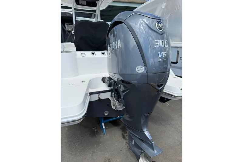 Slide: The Image of 2022 Edgewater 230CC boat with Yamaha 300 V6 outboard motor. - 22