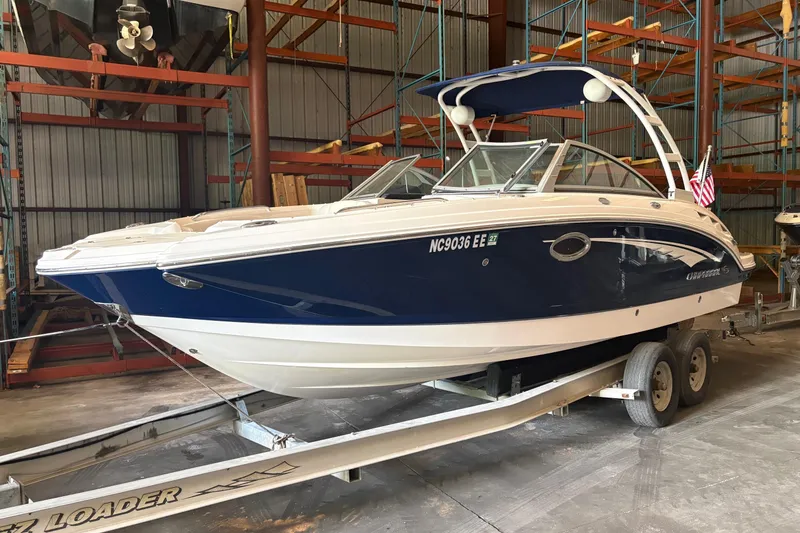 The Image of 2016 Chaparral 244 Sunesta boat on trailer in storage facility. - 0