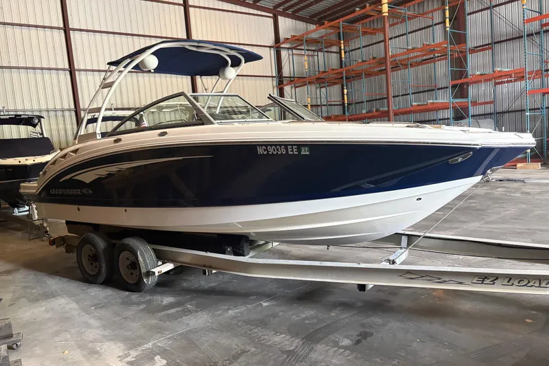 Slide: The Image of 2016 Chaparral 244 Sunesta boat on trailer in storage facility. - 2