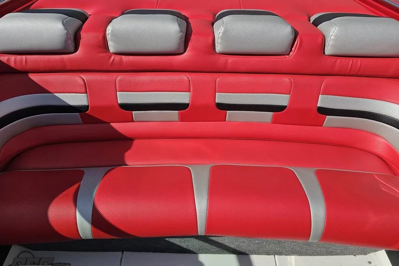 Slide: The Image of Red and gray seating on a 1997 Formula 382 FASTech boat. - 100