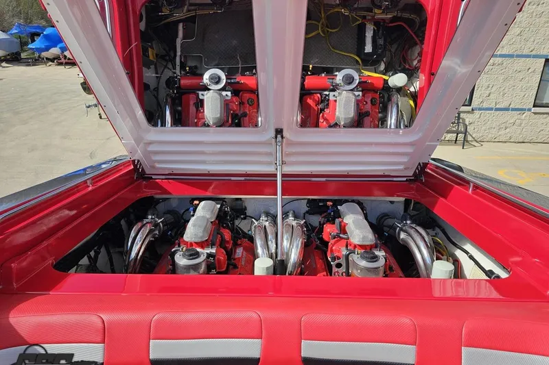 Slide: The Image of Engine compartment of a 1997 Formula 382 FASTech boat, showcasing dual powerful engines. - 106