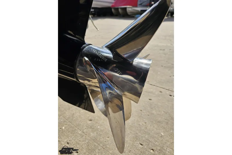 Slide: The Image of Close-up of a polished propeller on a 1997 Formula 382 FASTech boat. - 112