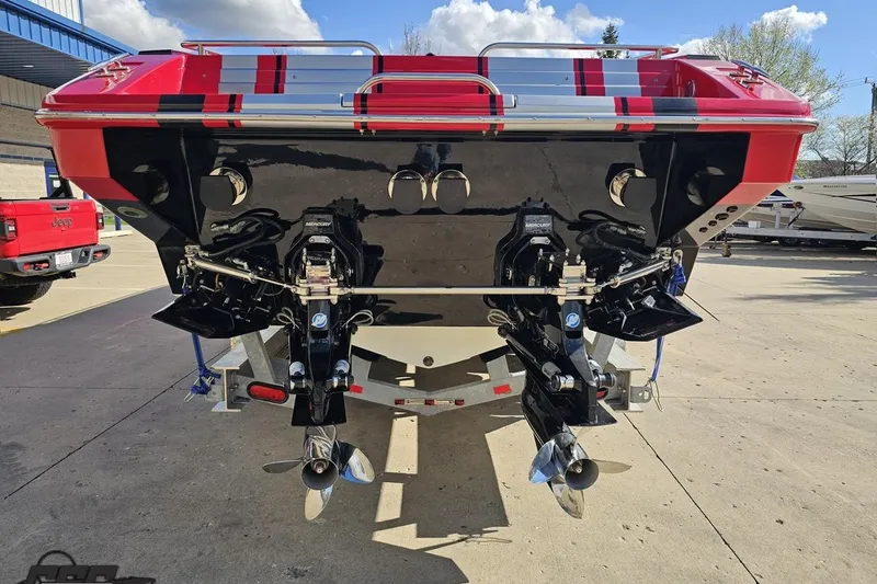 Slide: The Image of Rear view of a 1997 Formula 382 FASTech boat with dual propellers. - 27