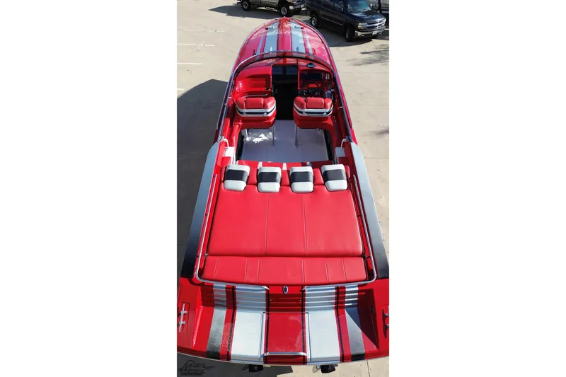 Slide: The Image of Red 1997 Formula 382 FASTech boat with striped upholstery and spacious seating. - 33