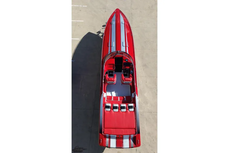 Slide: The Image of Overhead view of a 1997 Formula 382 FASTech boat, featuring a sleek red and white design. - 34