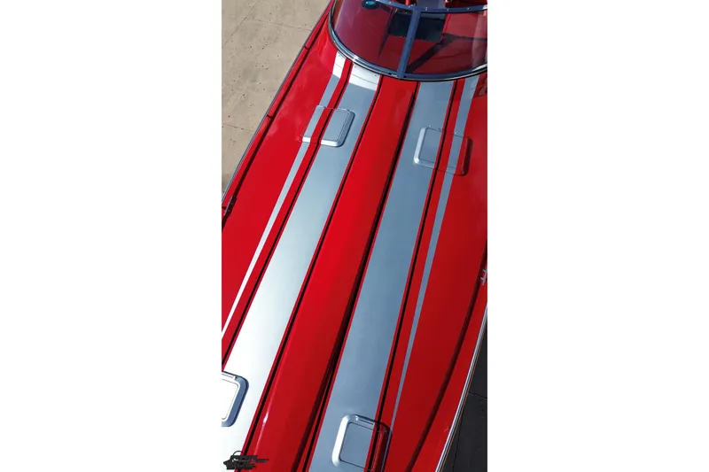 Slide: The Image of Red and silver 1997 Formula 382 FASTech boat with sleek design and racing stripes. - 39