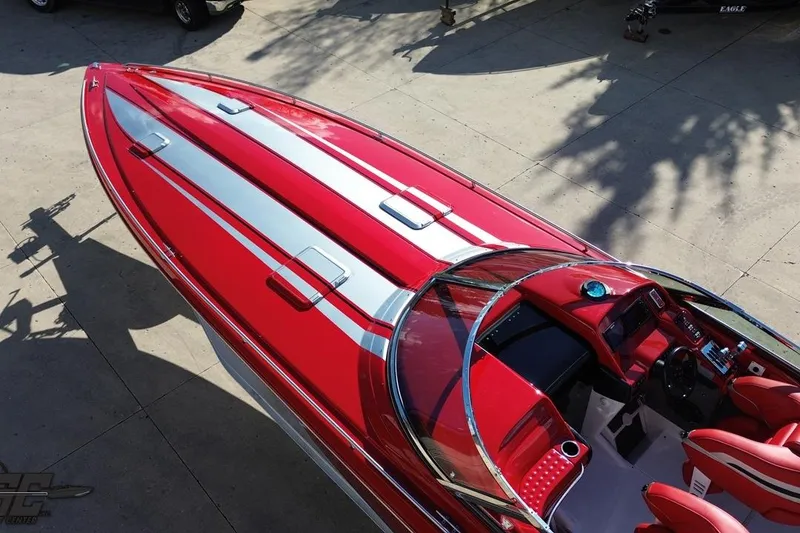 Slide: The Image of Red and silver 1997 Formula 382 FASTech speedboat with sleek design and open cockpit. - 43