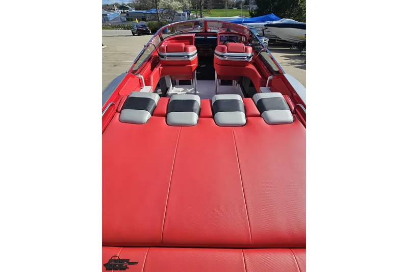 Slide: The Image of 1997 Formula 382 FASTech boat with vibrant red upholstery and sleek design. - 48
