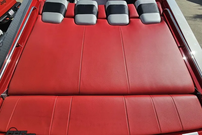 Slide: The Image of Red leather seating on a 1997 Formula 382 FASTech boat, featuring sleek design and comfort. - 49