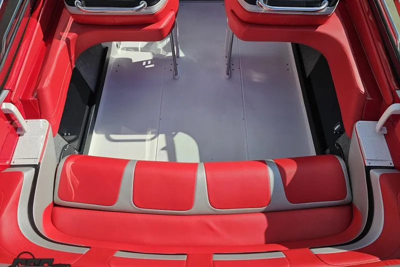 Slide: The Image of Red and gray interior seating of a 1997 Formula 382 FASTech boat. - 53