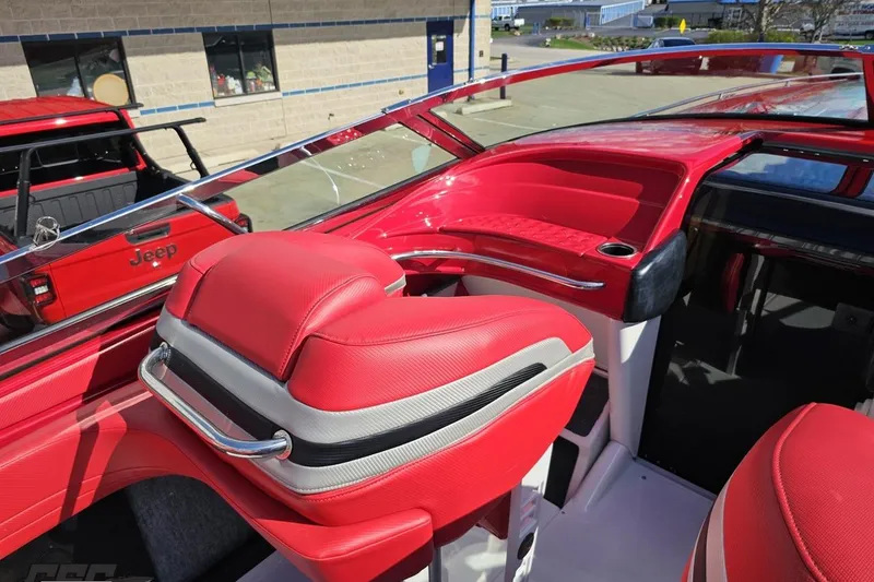 Slide: The Image of Red interior of a 1997 Formula 382 FASTech boat with sleek design elements. - 58
