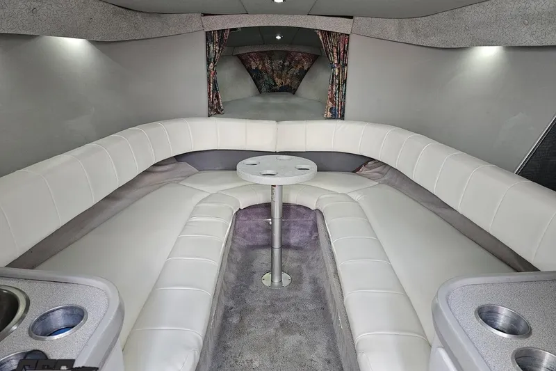 Slide: The Image of Luxurious interior of a 1997 Formula 382 FASTech boat with white leather seating. - 72