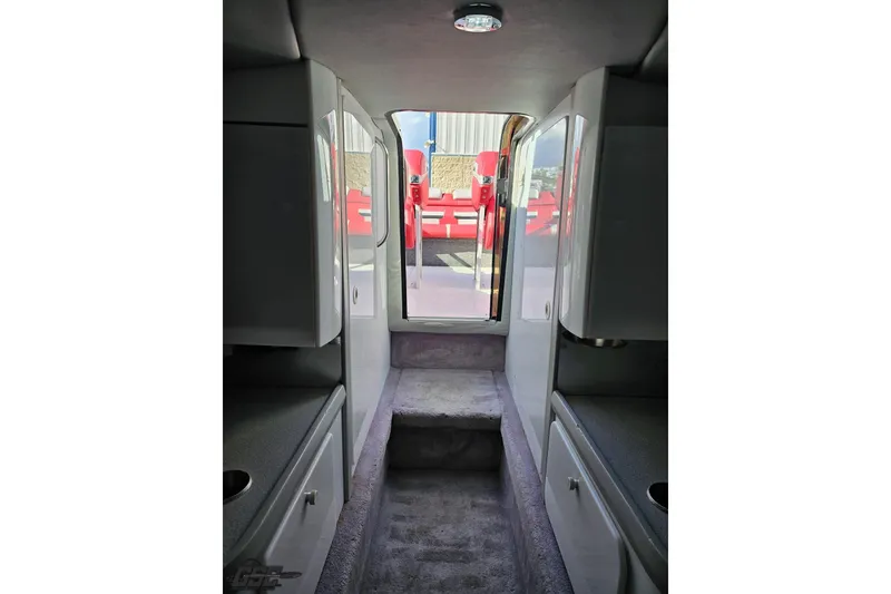 Slide: The Image of Interior view of a 1997 Formula 382 FASTech boat cabin with modern amenities. - 89