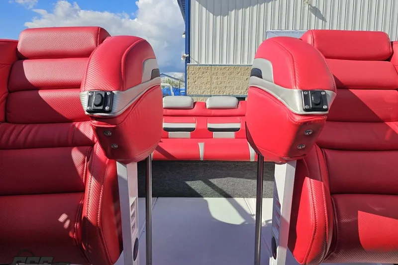 Slide: The Image of Red leather seats in a 1997 Formula 382 FASTech boat interior. - 93