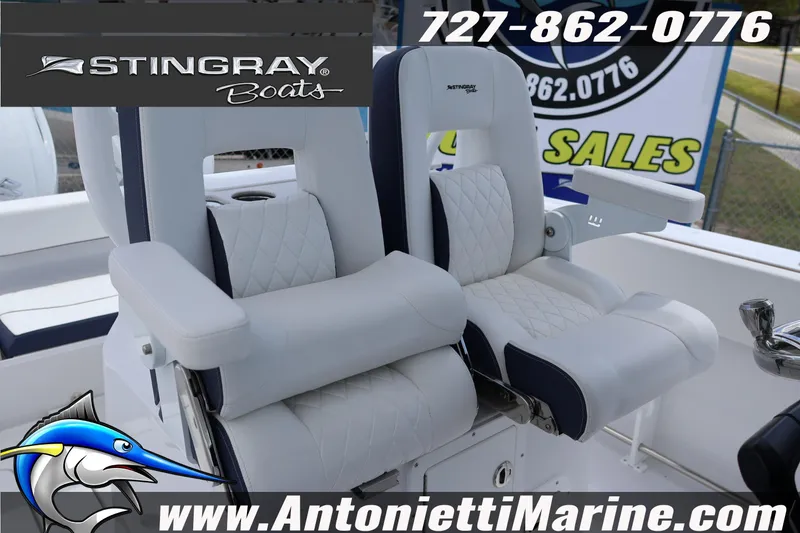 Slide: The Image of 2026 Stingray 253 CC boat seats with armrests, showcased by Antonietti Marine. - 16