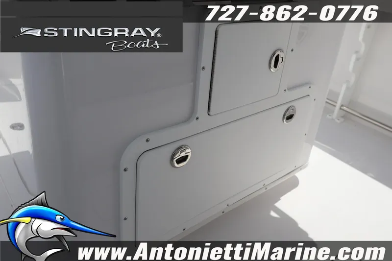 Slide: The Image of 2026 Stingray 253 CC boat interior with storage compartments, Antonietti Marine branding. - 21