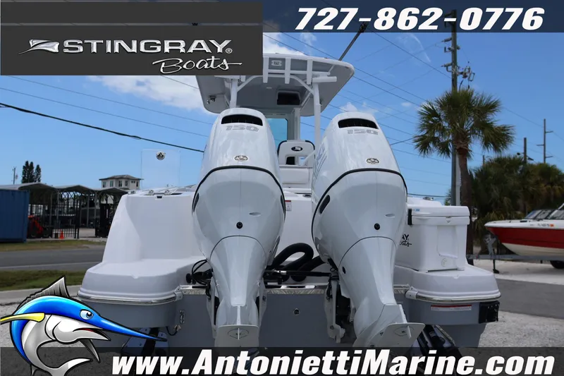 Slide: The Image of 2026 Stingray 253 CC boat with dual engines at Antonietti Marine dealership. - 3