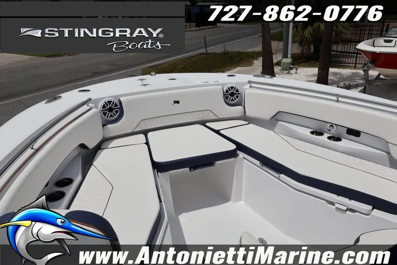 Slide: The Image of 2026 Stingray 253 CC boat interior with seating and speakers, displayed by Antonietti Marine. - 36