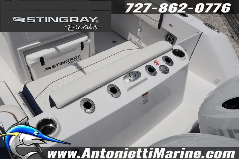 Slide: The Image of 2026 Stingray 253 CC boat interior with seating and fishing rod holders, featuring Antonietti Marine branding. - 45