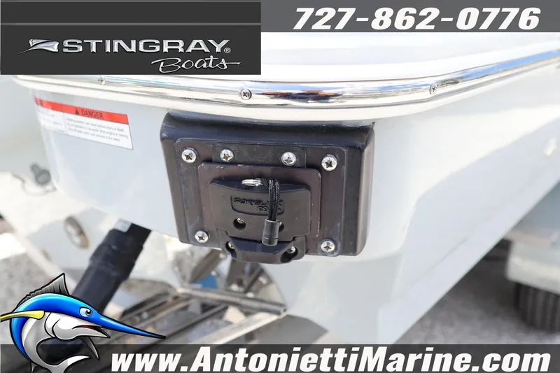 Slide: The Image of 2026 Stingray 253 CC boat detail with contact info and marine logo. - 46