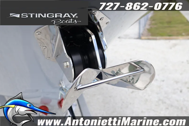 Slide: The Image of 2026 Stingray 253 CC boat anchor detail with contact information and logo. - 7
