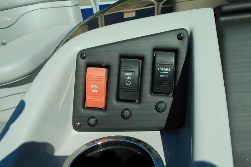 Slide: The Image of Control panel of a 2020 Bennington SV 188 SLV boat with switches for horn, dock lights, and livewell. - 13