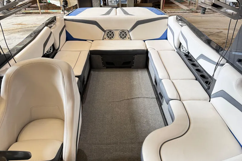 Slide: The Image of Interior of a 2015 Axis T23 boat with spacious seating and modern design. - 18