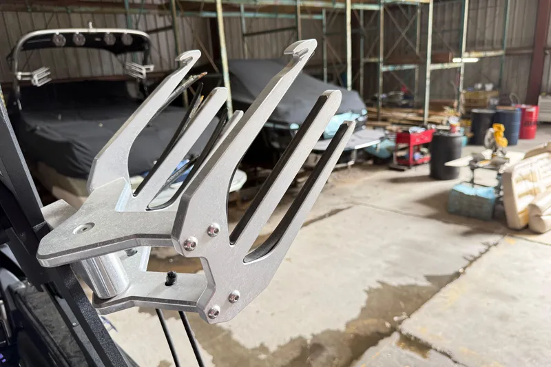 Slide: The Image of Boat rack in a garage with Axis T23, 2015 model, in the background. - 20