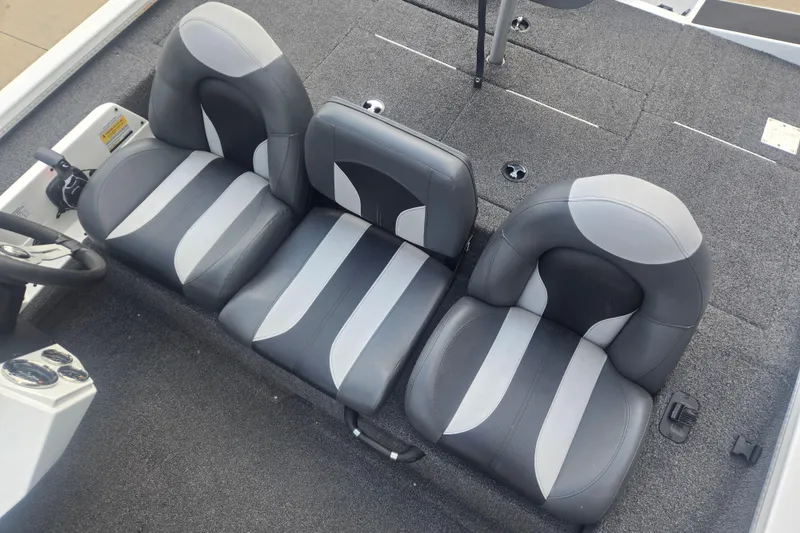 Slide: The Image of 2021 Vexus AVX181 boat interior with three gray and black seats. - 10