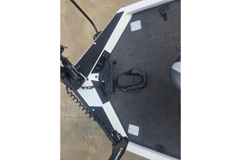 Slide: The Image of 2021 Vexus AVX181 boat deck with trolling motor and foot pedal controls. - 4