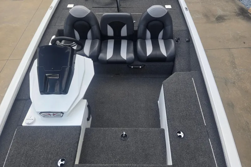 Slide: The Image of 2021 Vexus AVX181 boat interior with dual seats and steering console. - 7