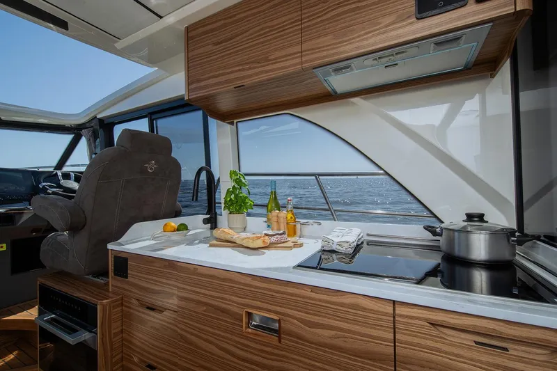 Slide: The Image of Manufacturer Provided Image: Luxurious Marex 390 yacht interior kitchen with modern amenities, 2025 model. - 10