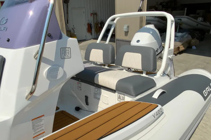 Slide: The Image of 2027 Gala V420 boat with dual seats, fiberglass construction, and modern design. - 5
