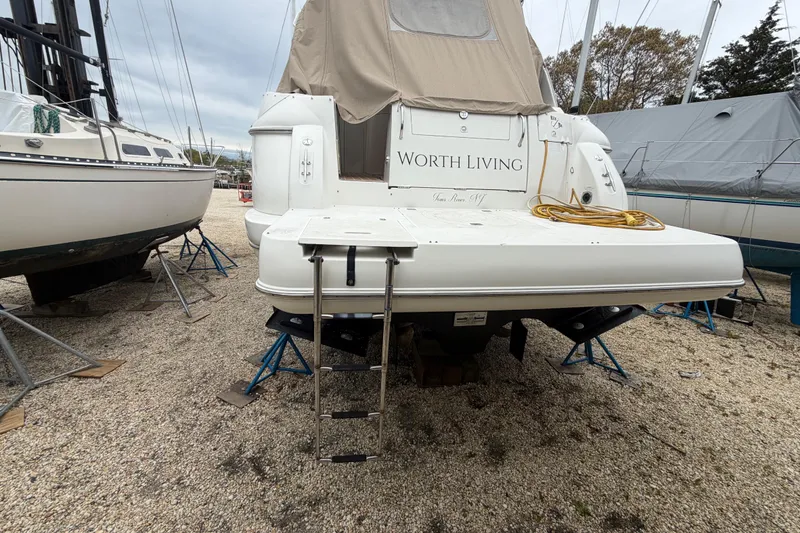 Slide: The Image of 2007 Cruisers Yachts 370 Express cockpit with navigation controls and marina view. - 13