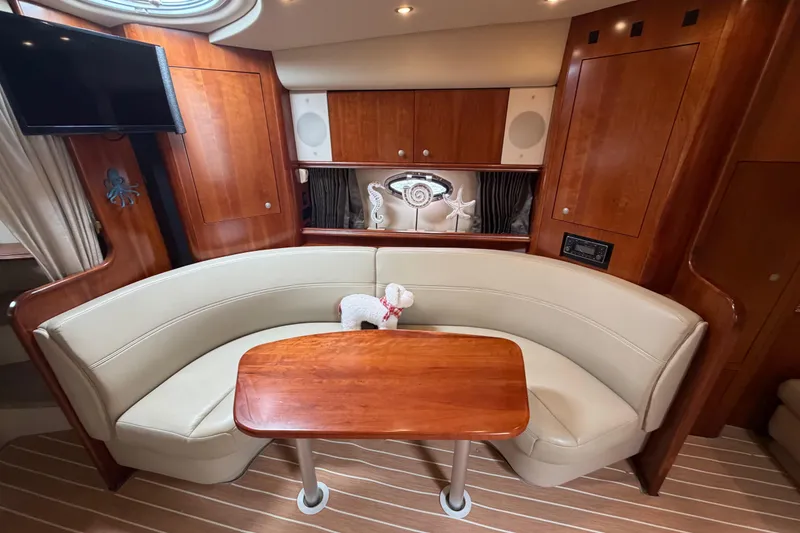 Slide: The Image of Luxurious 2007 Cruisers Yachts 370 Express interior with elegant wood and leather seating. - 18