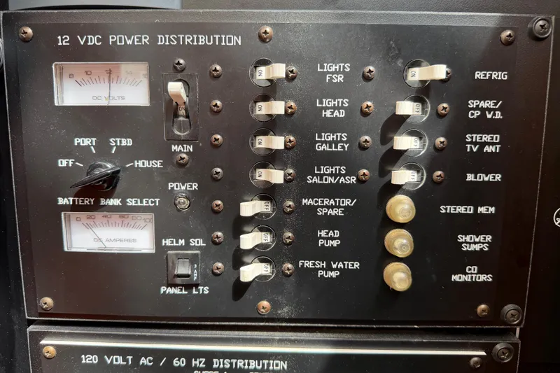 Slide: The Image of 12 VDC power distribution panel on a 2007 Cruisers Yachts 370 Express. - 28