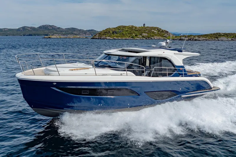 The Image of Manufacturer Provided Image: 2025 Marex 440 Scandinavia yacht cruising on open water, showcasing sleek design and luxury. - 0
