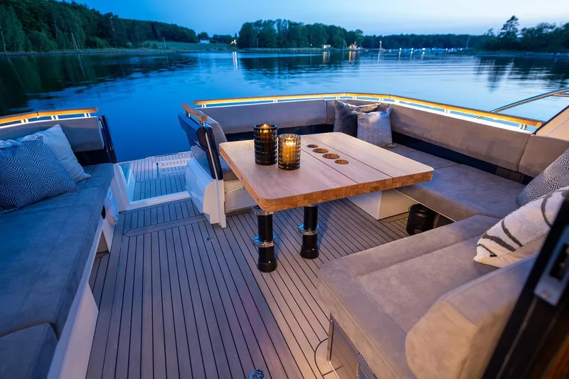 Slide: The Image of Manufacturer Provided Image: Luxurious 2025 Marex 440 Scandinavia yacht interior with elegant seating and ambient lighting. - 8