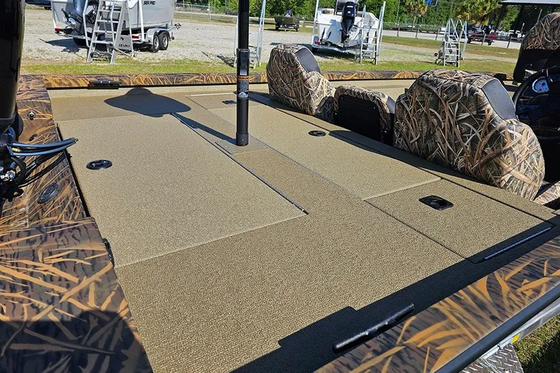 Slide: The Image of 2026 G3 Sportsman 1810 boat with camo seats and spacious deck, ideal for fishing. - 8