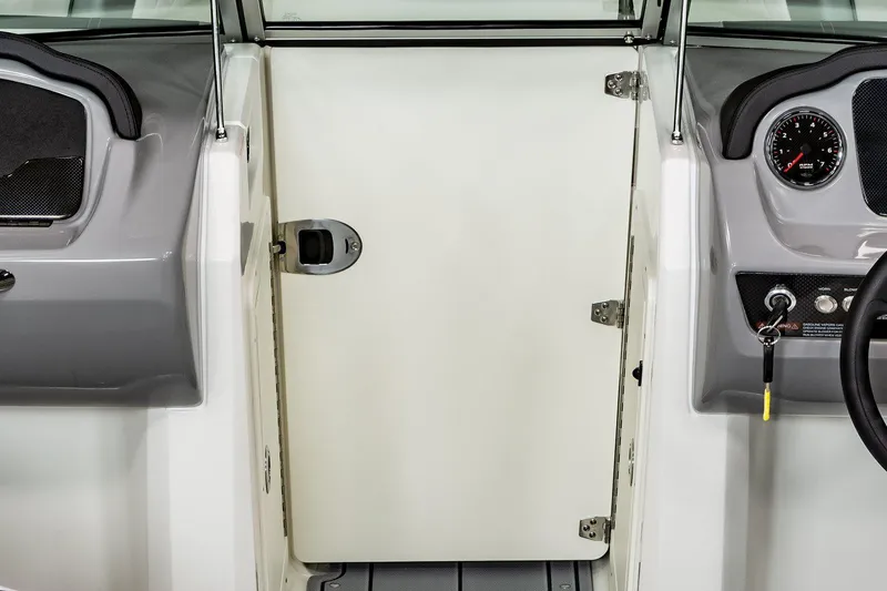 Slide: The Image of Manufacturer Provided Image: 2022 Chaparral 21 Surf boat interior dashboard and cabin door. - 19