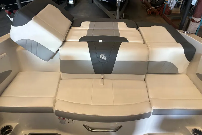 Slide: The Image of 2022 Chaparral 21 Surf boat interior with stylish seating and modern design. - 4