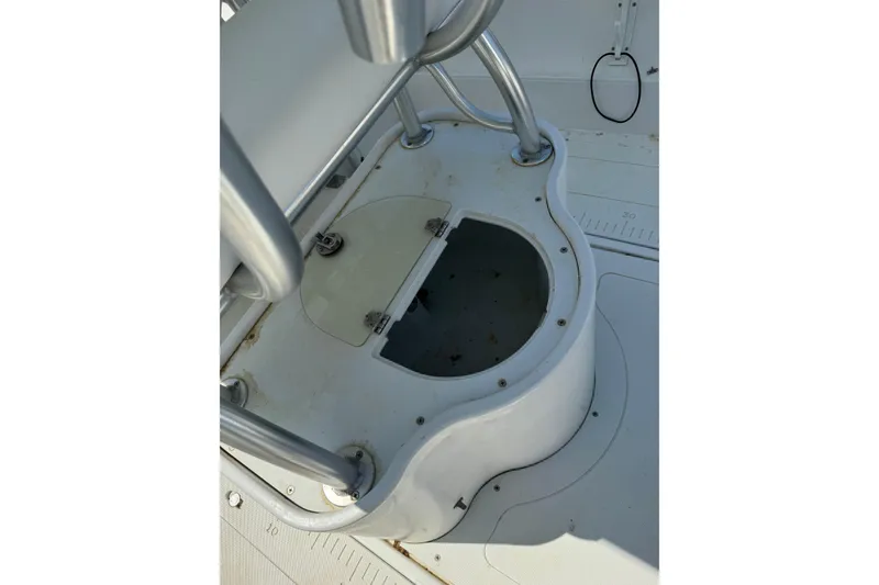 Slide: The Image of 2007 Triumph 215 TE boat interior with open storage compartment. - 15