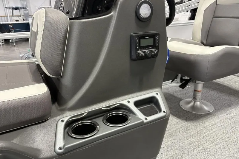 Slide: The Image of 2026 Sun Tracker Bass Buggy 16 XL Select interior with cup holders and seating. - 20